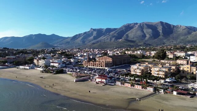 Aerial view of Scauri beach with abandoned old factory construction along the coast 3