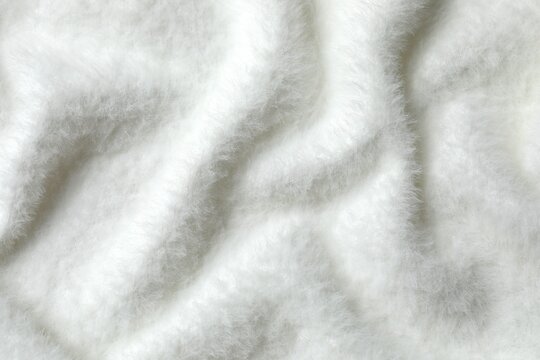 Top view of white fabric background, cashmere texture