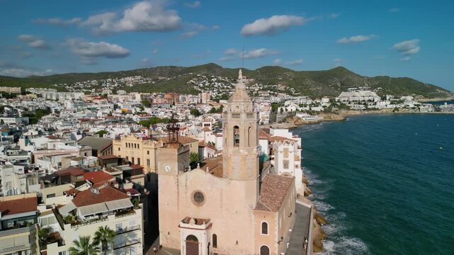 Church of Saint Bartholomew in Sitges, Barcelona, ​​Spain - aerial drone view