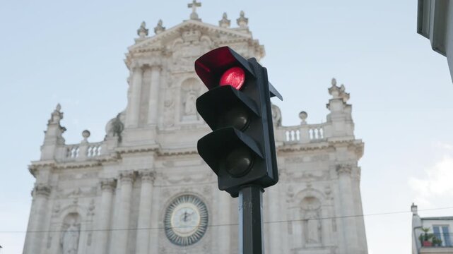Red Traffic Light Against Beautiful Architecture in Bright Daylight Paris
