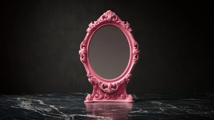 A pink mirror with gold trim sits on a black marble countertop