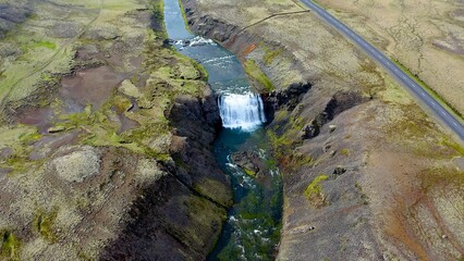 Aerial view of the beautiful Thorufoss waterfall and river in the highlands of Iceland.