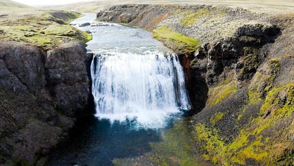 Aerial view of the beautiful Thorufoss waterfall and river in the highlands of Iceland.
