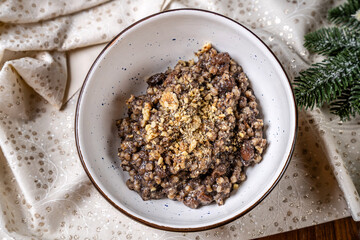 Festive traditional kutia with nuts in bowl