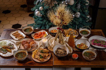 Traditional Christmas dinner table with festive dishes
