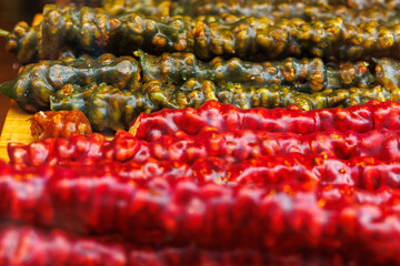 Traditional Georgian churchkhela candy displayed at market stall close up