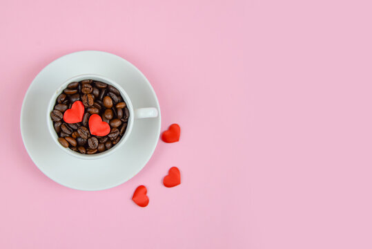 Ceramic cup with hearts on pink background. Valentine's day concept - Powered by Adobe
