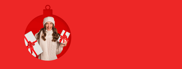 A joyful woman in a warm sweater and hat holds two beautifully wrapped gifts against a vibrant red background. The scene captures the spirit of celebration during the winter holiday season.