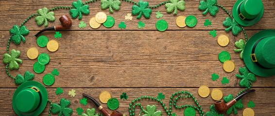 st. patrick's day wooden background with shamrocks, coins, and irish hats in festive arrangement