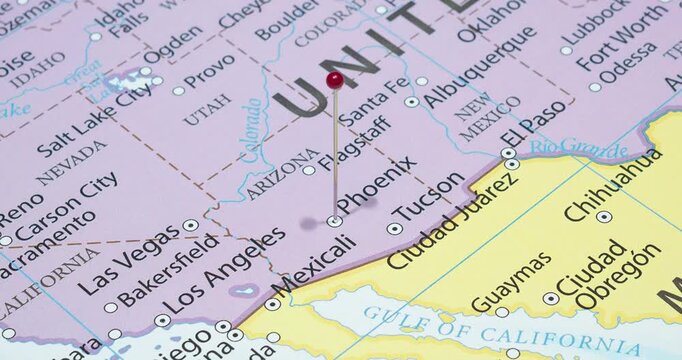 A zoom out of a red pin into Phoenix city of The United States of America political map