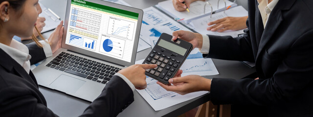 Business intelligence and data analysis concept. Analyst team working on financial data analysis...