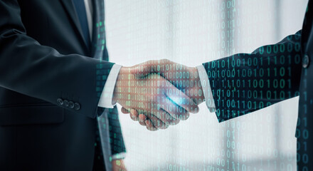 A close-up shot of two businessmen shaking hands, with a digital binary code overlay symbolizing technology and partnership in a corporate setting.