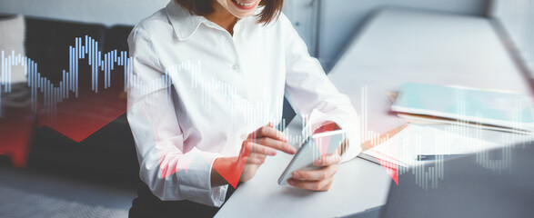 A young woman relaxes in a bustling coworking space, happily texting friends on her cellphone during her break. She appreciates the casual vibe of the modern office environment.