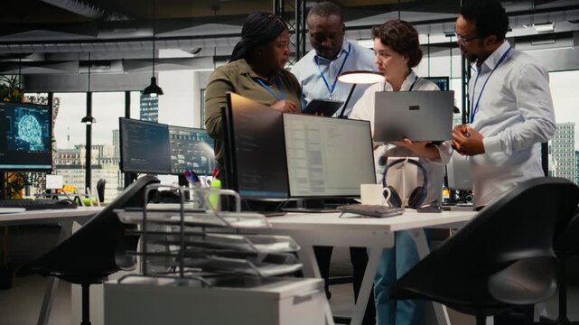 Engineering team working together in office, using specialized hardware to accelerate complex AI calculations. Coworkers cooperating, managing systems for machine learning training datasets, camera A