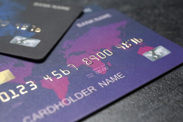 Credit cards on black grunge table