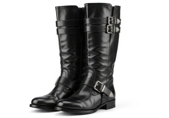 Tall black leather harness boots feature polished metal buckles on a white background