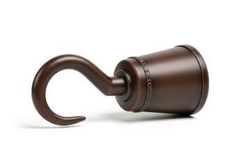 Ornate, dark metallic attachment with a curved hook rests isolated on a white background
