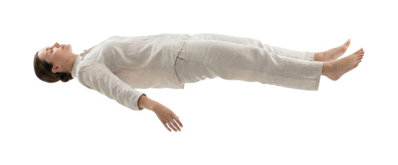 Young woman floating while sleeping. Dream concept