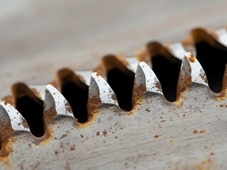 Close-up on weathered, industrial gear with rust and visible degradation