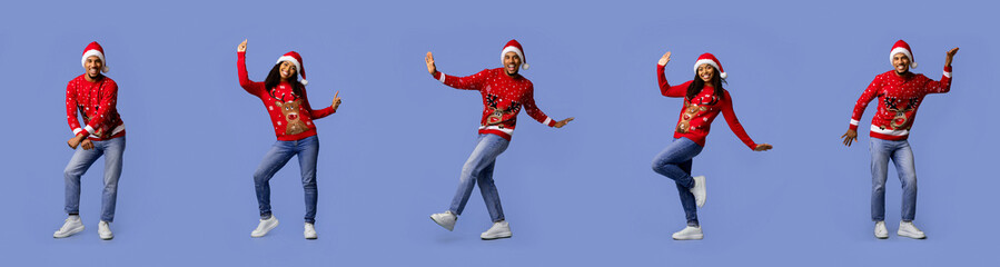 A joyful individual dances happily while wearing a bright red Christmas sweater adorned with decorations. The background is a solid blue, enhancing the cheerful atmosphere of the scene.