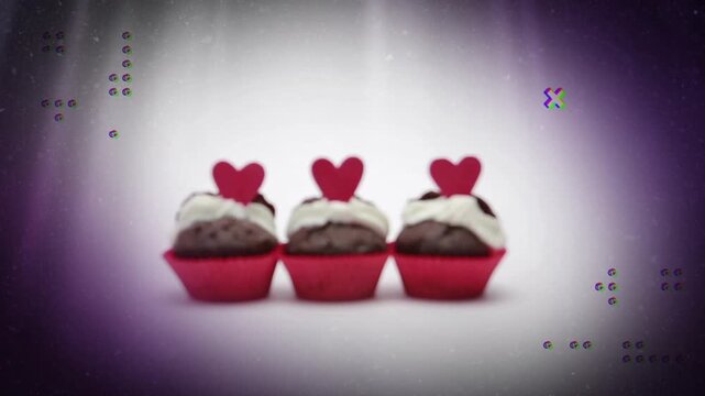 Circular loader appearing prompts three cupcakes softening and blurring, revealing product showcase