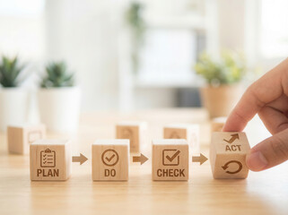 Wooden cubes representing workflow enhancement aligned manually using shallow depth and clean soft blurred atmosphere..png