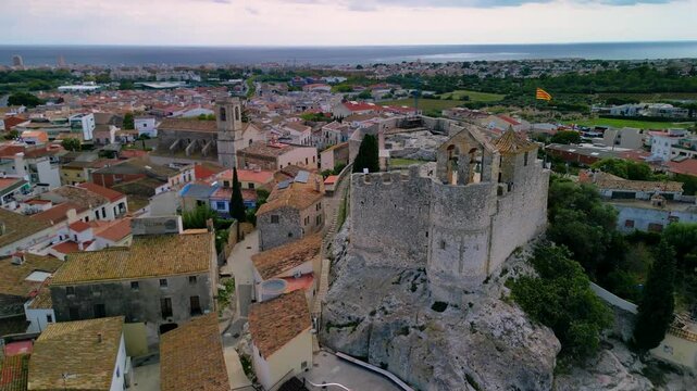 Medieval castle in Calafell, Barcelona, ​​Spain - 4K aerial drone view , Castell de la Santa Creu de Calafell 