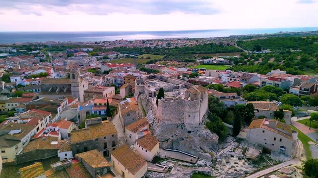 Medieval castle in Calafell, Barcelona, ​​Spain - 4K aerial drone view , Castell de la Santa Creu de Calafell 