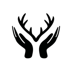 Obraz premium Hands holding deer antlers symbolizing protection and nature