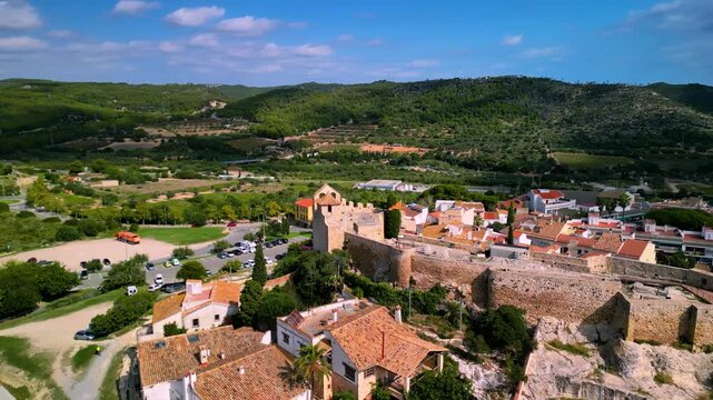 Medieval castle in Calafell, Barcelona, ​​Spain - 4K aerial drone view , Castell de la Santa Creu de Calafell 