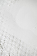 Close up of Abstract Background of Light Textured Powder