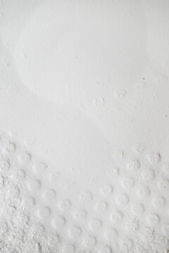 Close up of Abstract Background of Light Textured Powder