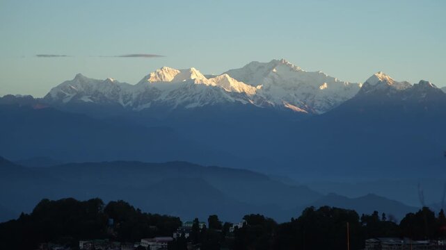 Kanchenjunga mountain is visible in the distance..