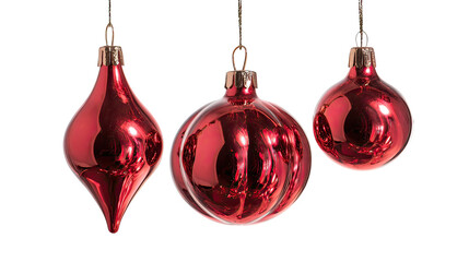 Three red glass baubles hanging in spherical and teardrop shapes on transparent background
