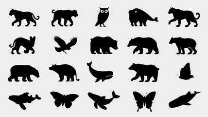 Obraz premium Black silhouettes of various animals including cats, bears, owls, and more in different poses