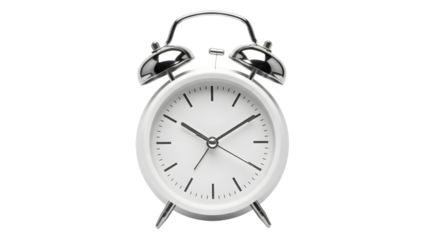 Vintage white alarm clock with twin bells isolated on a black background