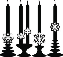 Silhouette of four black candles with snowflake decorations on white background