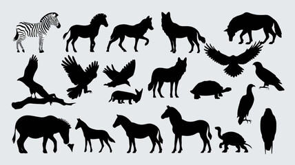 Fototapeta premium Black silhouettes of various animals including zebra, horse, wolf, bird, turtle, and more