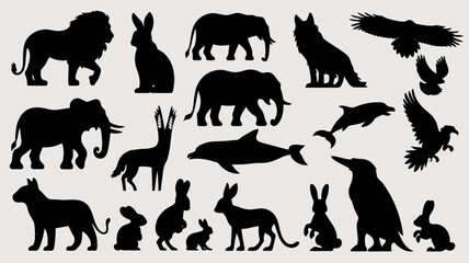 Naklejka premium Silhouettes of various animals including lions, elephants, rabbits, birds, and more in black shapes on