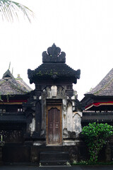 Balinese Stone Gate Building Entrance with Tiled Roofs