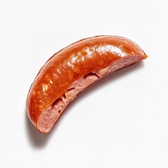 Close up of a smoked kielbasa sausage cut in half revealing the texture and savory interior against a clean on white background