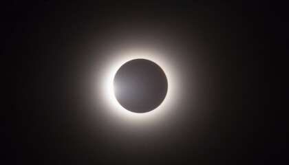 Close-up of a solar eclipse, diamond ring effect, astronomy background