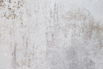 Old rough cement wall texture with light brown stains, natural and rustic look, ideal for background or industrial design use