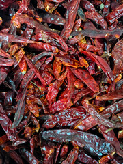 Close-Up Texture of Dry Red Chilies – Spicy Indian Food Ingredient, vertical