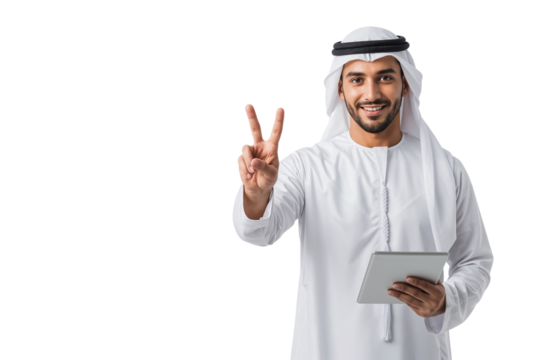 Smiling Arab businessman in a white thobe and ghutra holding a tablet and makes a peace sign, isolated on transparent background - Powered by Adobe