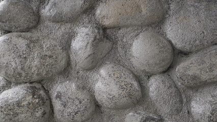 background of cemented rocks on the wall