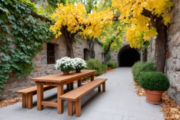 Cozy autumn courtyard with stone walls and tunnel entrance