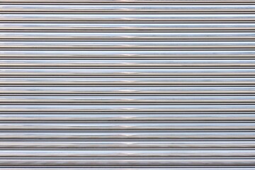 Shiny metallic roll up steel door pattern background