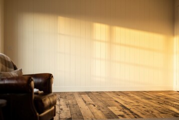 Warm cozy living room blank wall mockup, empty feature wall ready for artwork, Scandinavian hygge interior with natural wood tones and soft lighting, perfect for wall art presentation and home decor