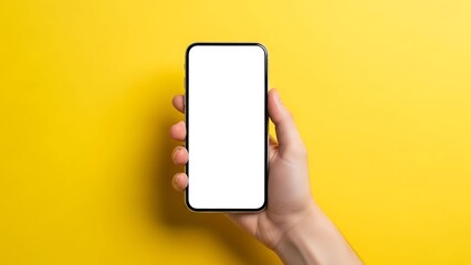 Hand holding a smartphone with a blank screen